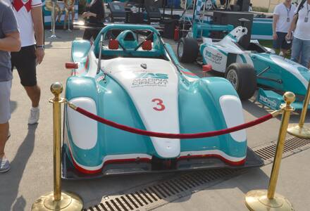 racing cars on display in yas marina circuit