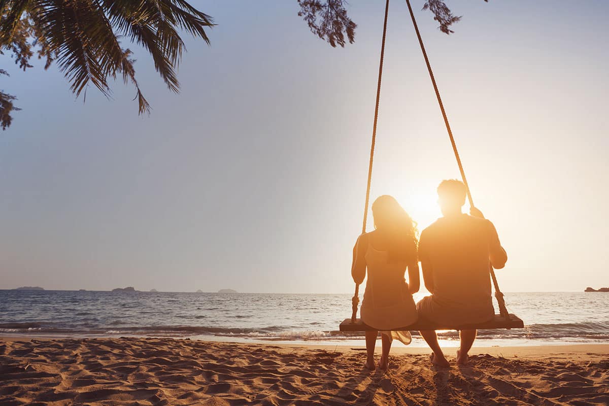 couple sunset beach